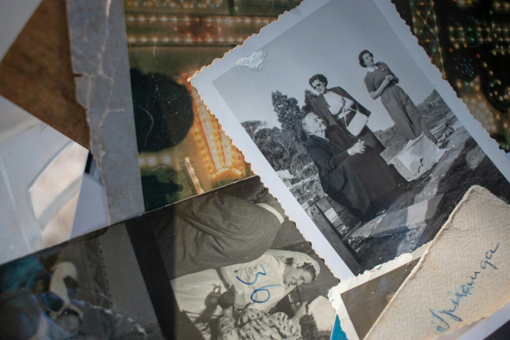 A nostalgic collection of vintage black and white family photographs that evoke memories.