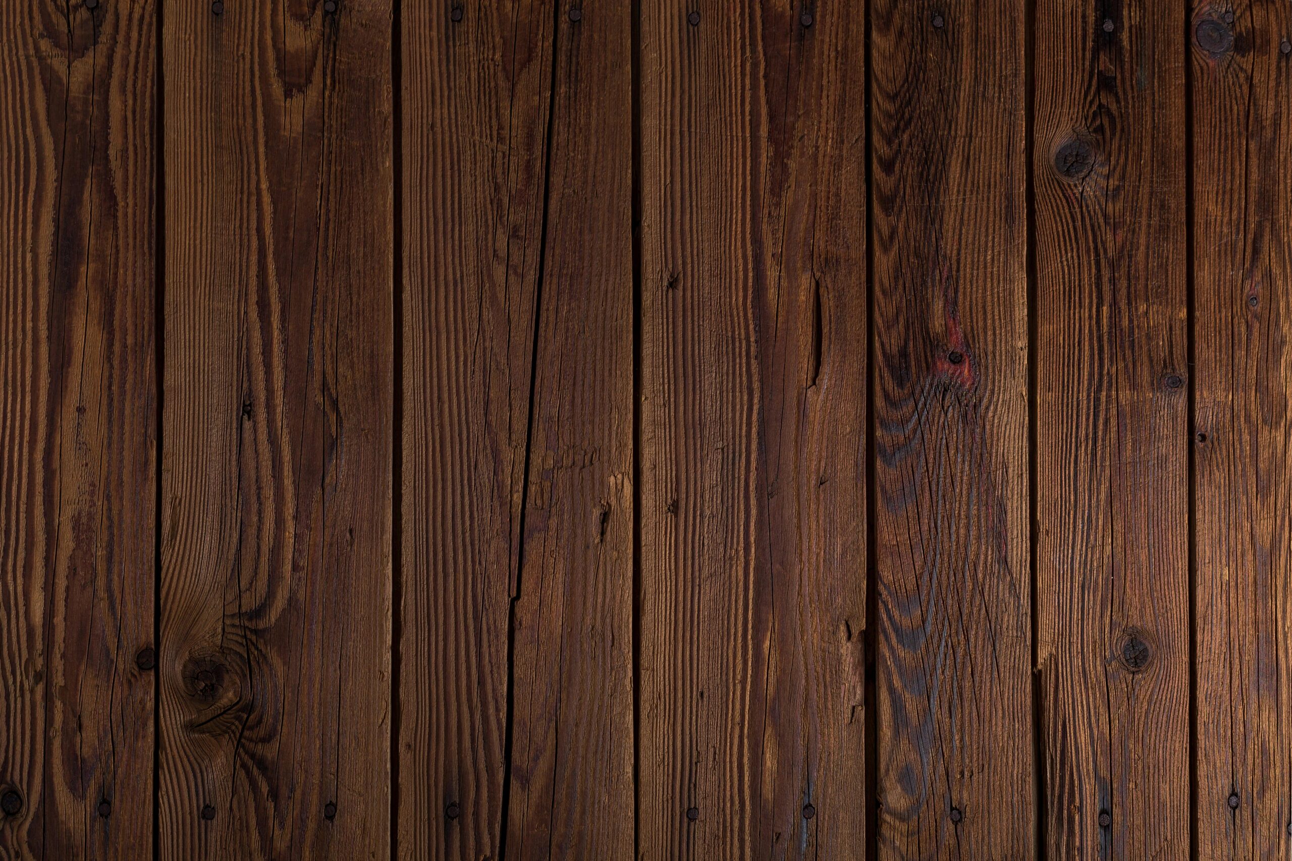 High-quality rustic wooden wall texture, perfect for backgrounds.