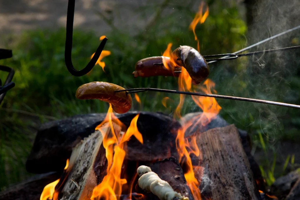 Bonfire sausages at a summer party at Kettukallio