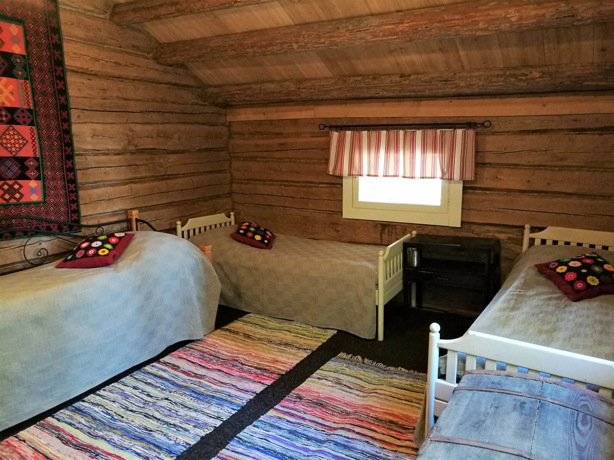 beds at kukko luhtiaitta accomodation at kettukallio